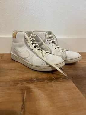 Nike White Mid-Top Sneakers with Tan Heel Accent